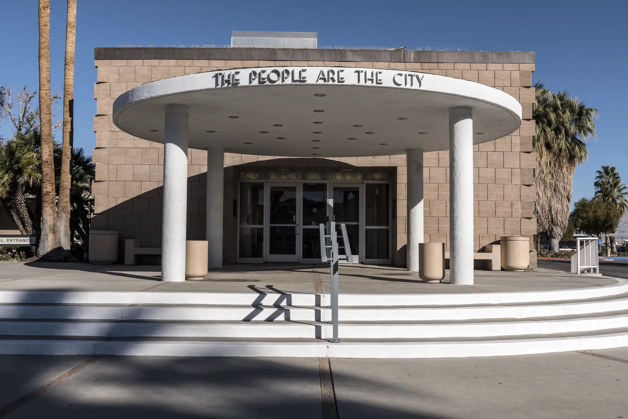 Palm Springs City Hall, with the lettering “THE PEOPLE ARE THE CITY” at the Council Chamber entrance.