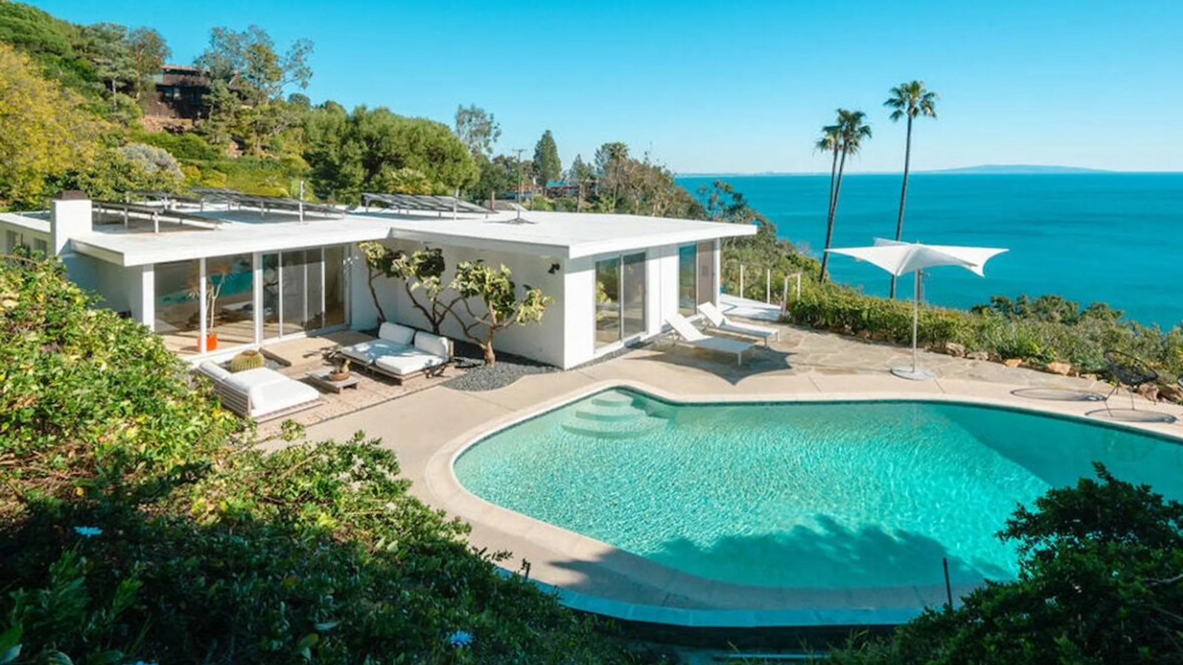 Seaboard Road, Malibu: the pool on its bluff above Big Rock, the Pacific beyond.